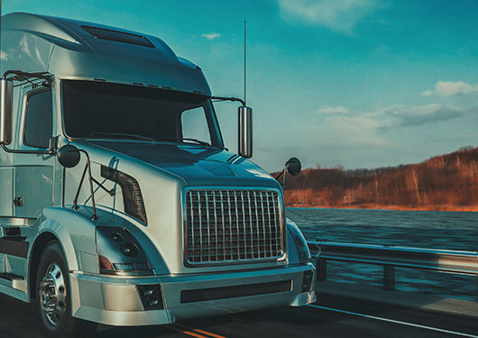 Truck on a highway with commercial auto insurance in Mansfield, LA