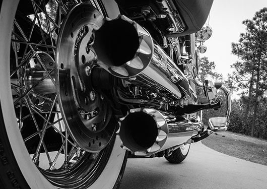 Close up of motorcycle exhaust with auto insurance in Haughton, LA